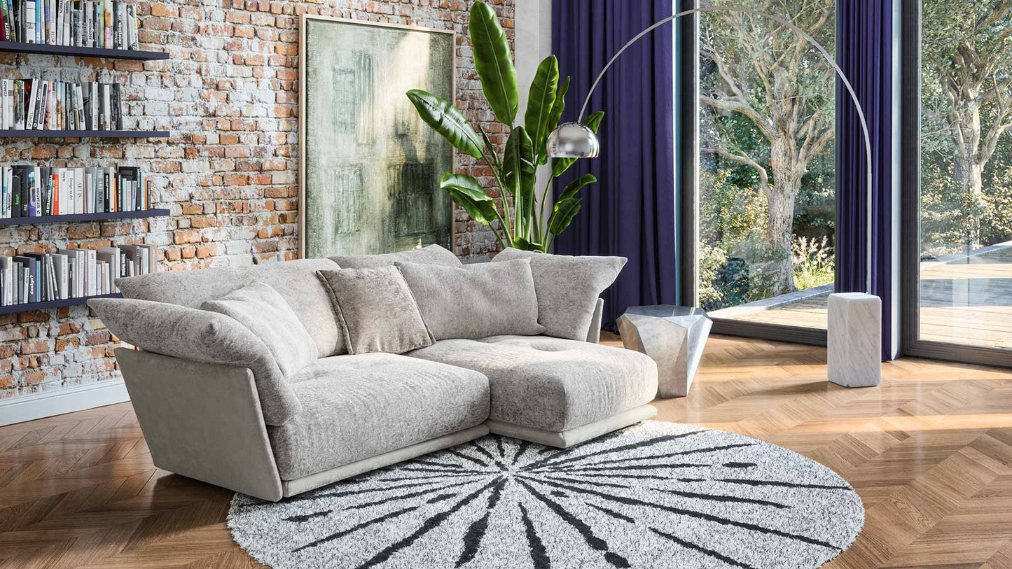 Kleines Sofa Esfera von Bretz in grau.