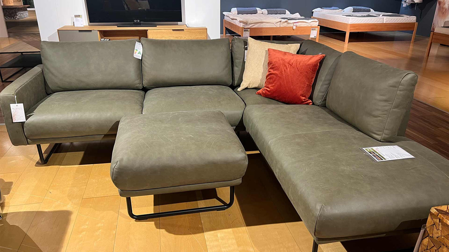 Sofa-zum-abverkauf-gruen-leder-reduziert