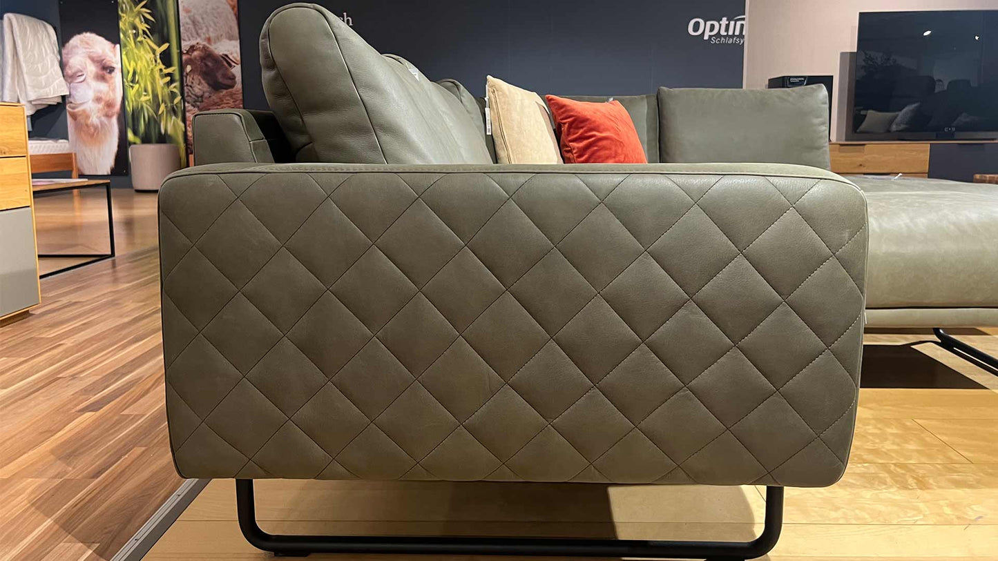 Sofa-zum-abverkauf-gruen-leder-reduzie