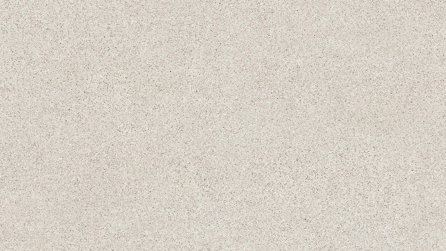 Keramik Arbeitsplatte in einem warmen beige mit leichten, feinen schwarzen Sprenklern in der Farbe Seminato Candido..