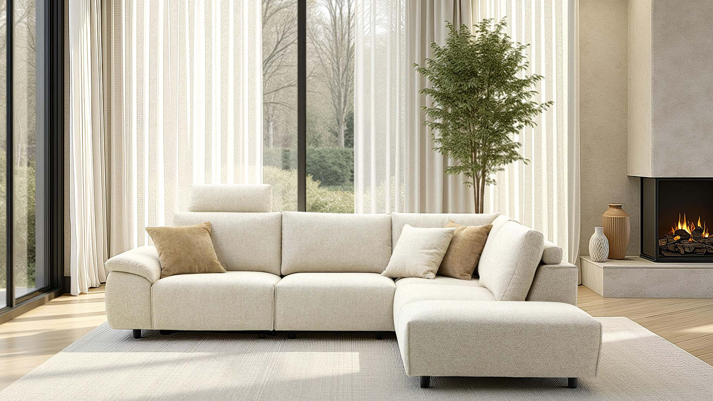 Modulares Sofa von Sitzkunst in hellem Stoff.