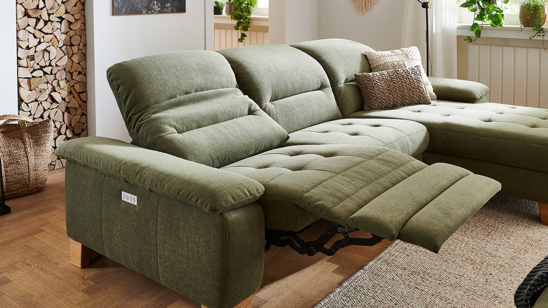 Elektrisch verstellbares Sofa in Grün