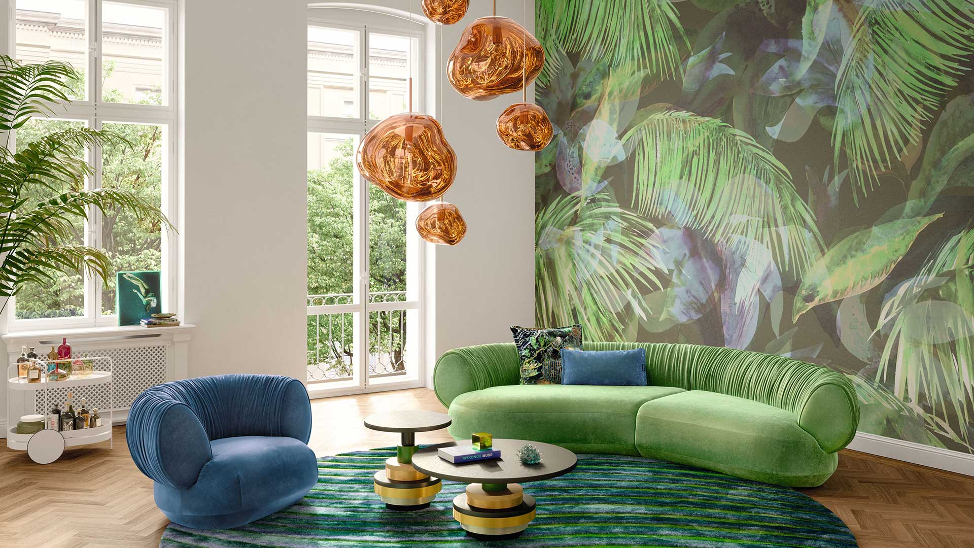 Modernes Wohnzimmer mit der Bretz Couch Nanami in grünem Velours und der Sessel Nanami in einem blauen Velours.