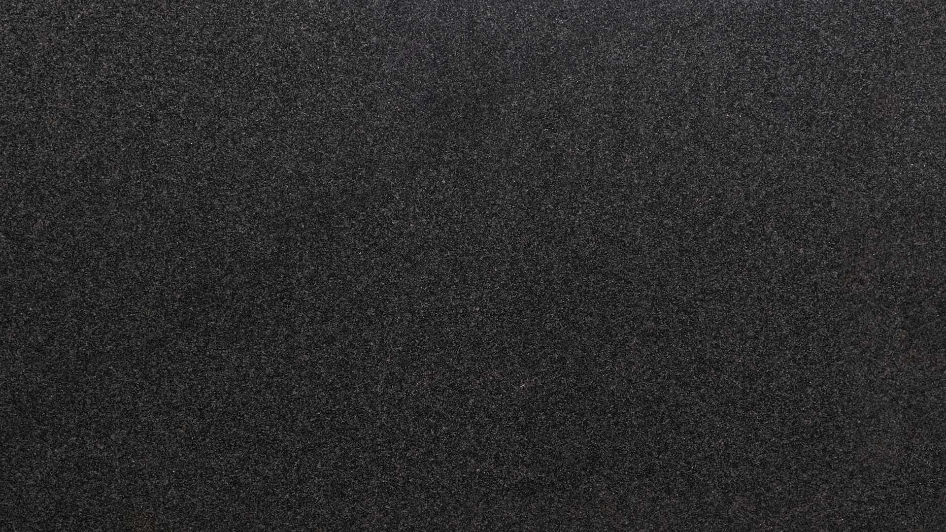 Naturstein Küchenarbeitsplatte mit schwarzer Grundfarbe in poliert oder matt mit feinen weißen Sprenklern wie ein Sternenhimmel in dunkler Nacht in der Farbe Nero Africa Impala.