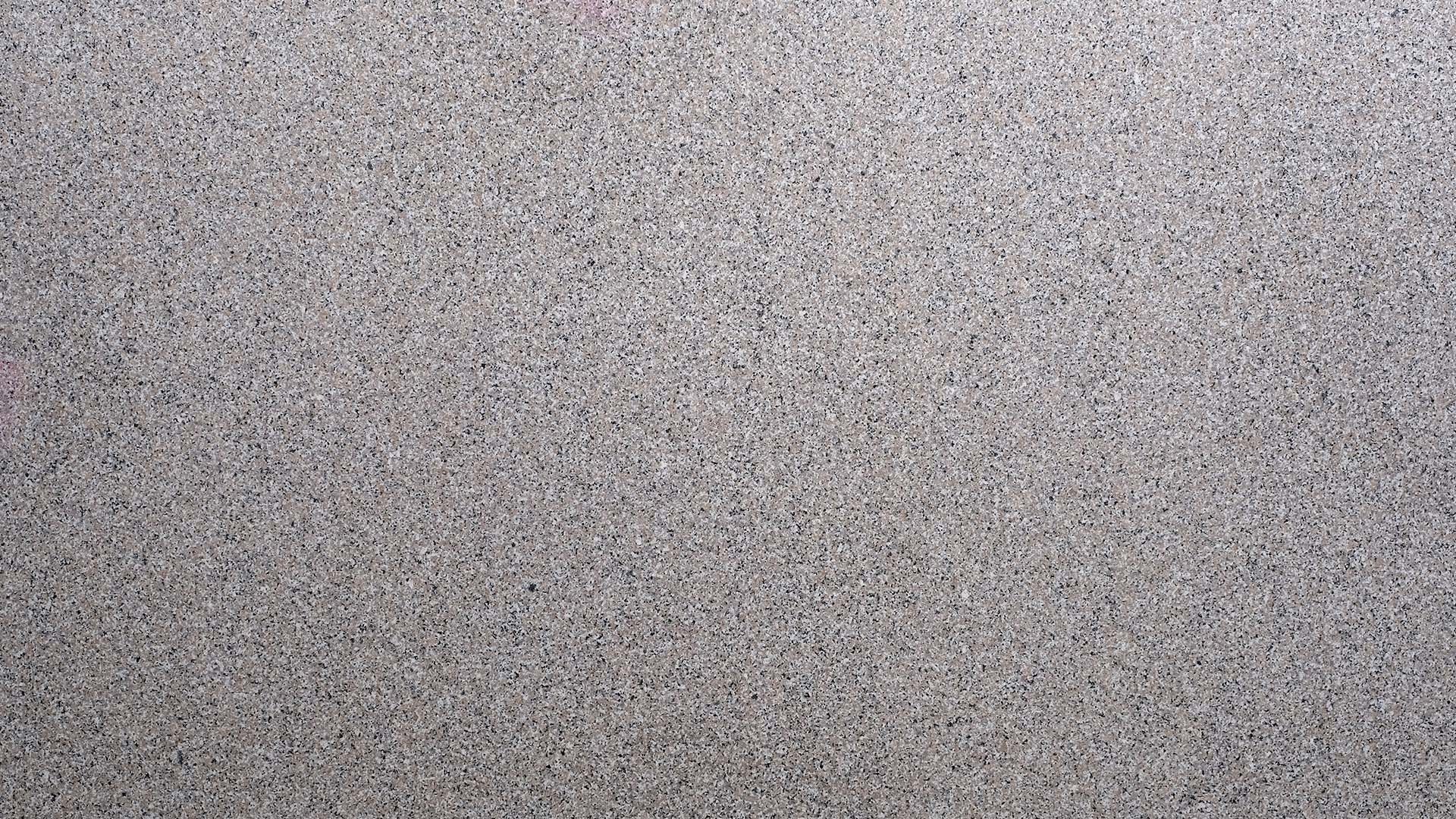 Naturstein Küchenarbeitsplatte weiss-braun-schwarz gleichmässig gesprenkelt in der Farbe Rosa Beta.